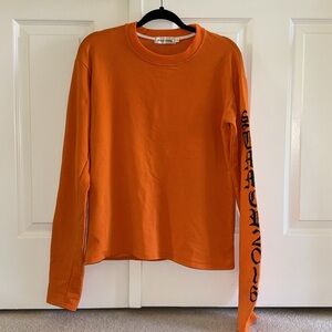 NWOT UO Orange Long Sleeve Shirt with Lettering